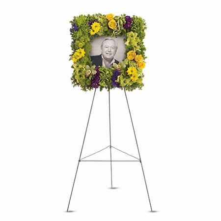 Funeral picture frame sympathy flowers arrangement with green cymbidium orchids