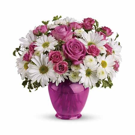 Pink rose and white daisy chrysanthemum bouquet with ginger jar