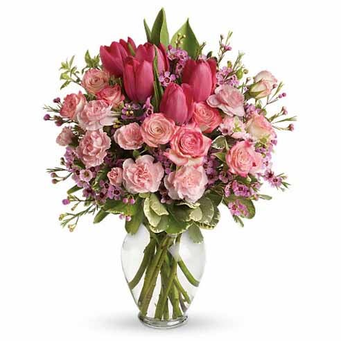 A Bouquet of Pink Roses, Hot-Pink Tulips, Pale-Pink Carnations, Pitta Negra, Variegated Pittosporum and Waxflower in a Glass Vase