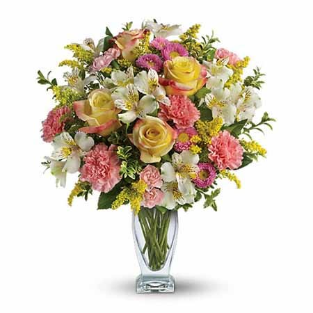 Pastel yellow rose bouquet with pink carnations, white alstroemeria and Easter flowers
