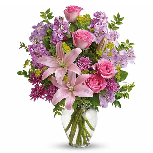 A Bouquet of Pink Asiatic Lilies, Pink Roses, Lavender Alstroemeria and Lavender Cushion Spray Mums in a Glass Vase