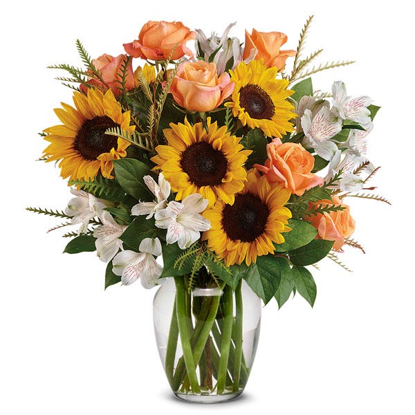 Sunflower and orange roses bouquet in a keepsake light blue ombré flower vase