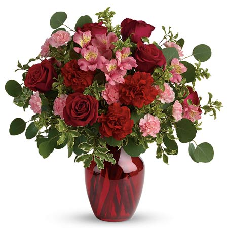 Valentine's Day flower delivery with red roses and carnations and pink alstroemeria