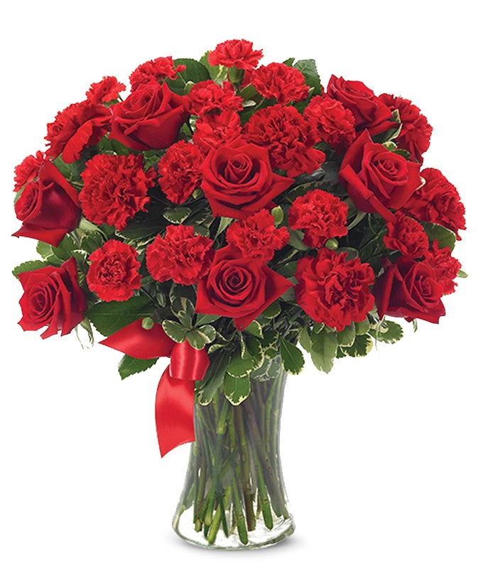 A Bouquet of Red Roses in  Glass Vase