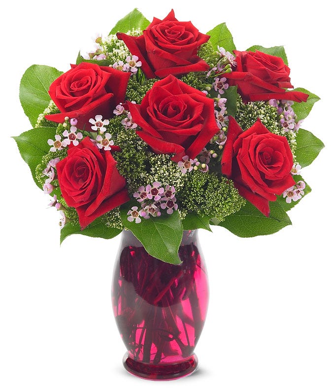Half dozen red roses for Valentine delivered in a pink vase