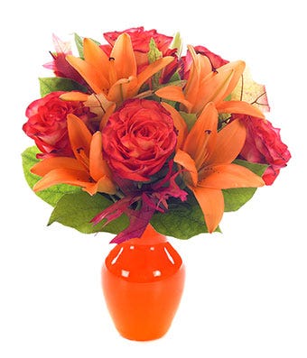 Orange roses with orange lilies delivered in a orange vase today