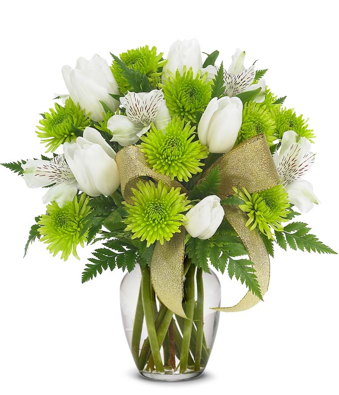 White tulips, green mums and alstroemeria in green vase