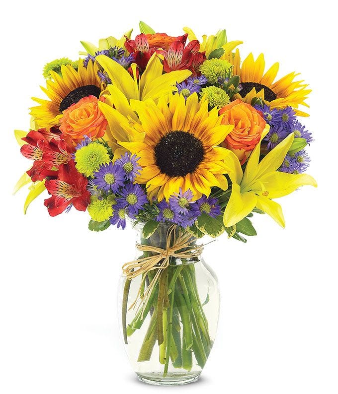 Mixed flower arrangement with sunflowers and orange roses for delivery today
