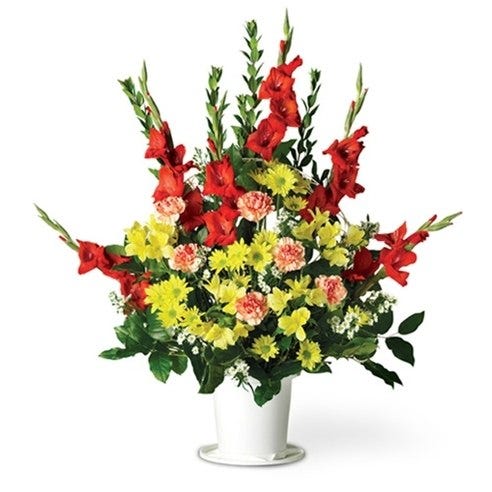 Sympathy flowers with red, yellow and pink flowers