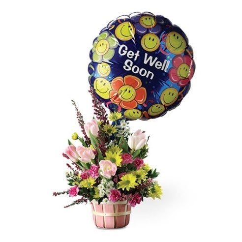 Pink tulips and purple flowers in basket with get well soon balloon