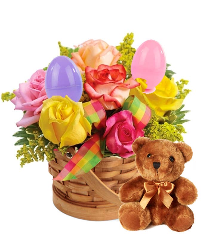 A Bouquet of Yellow, Peach, Coral and Pale Roses and Lush Greens in a Cute Basket with Decorative Bow and Plush Teddy