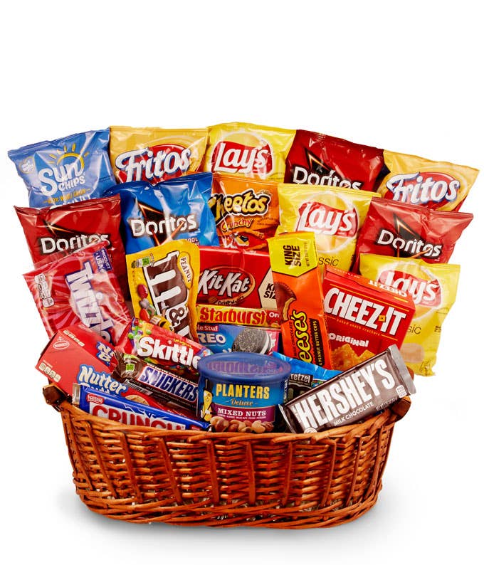 Sweet & Savory Goodies  Creatively Hand Arranged in a Woven Basket with White Bow and Card Message