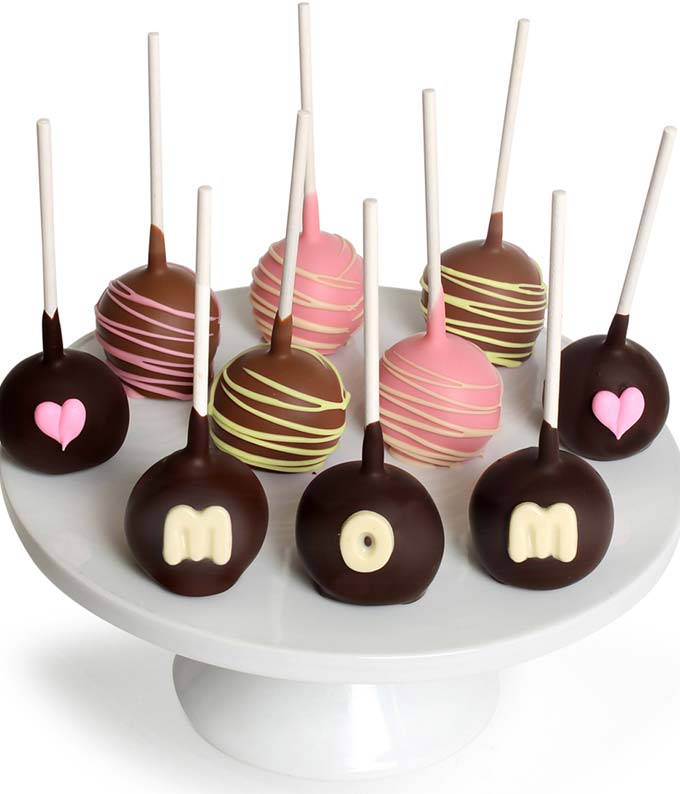 Set of 10 chocolate-covered cake pops for Mother's Day, decorated in a pink theme with edible 'MOM' message, beautifully presented.