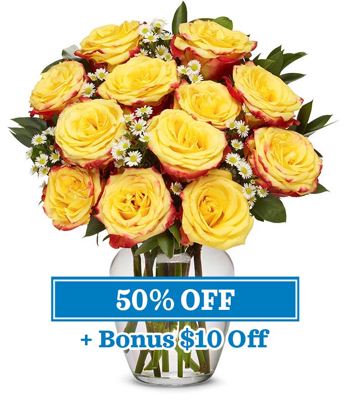 Bouquet featuring 12 Circus Roses, with optional vase and card message, packed in a box.