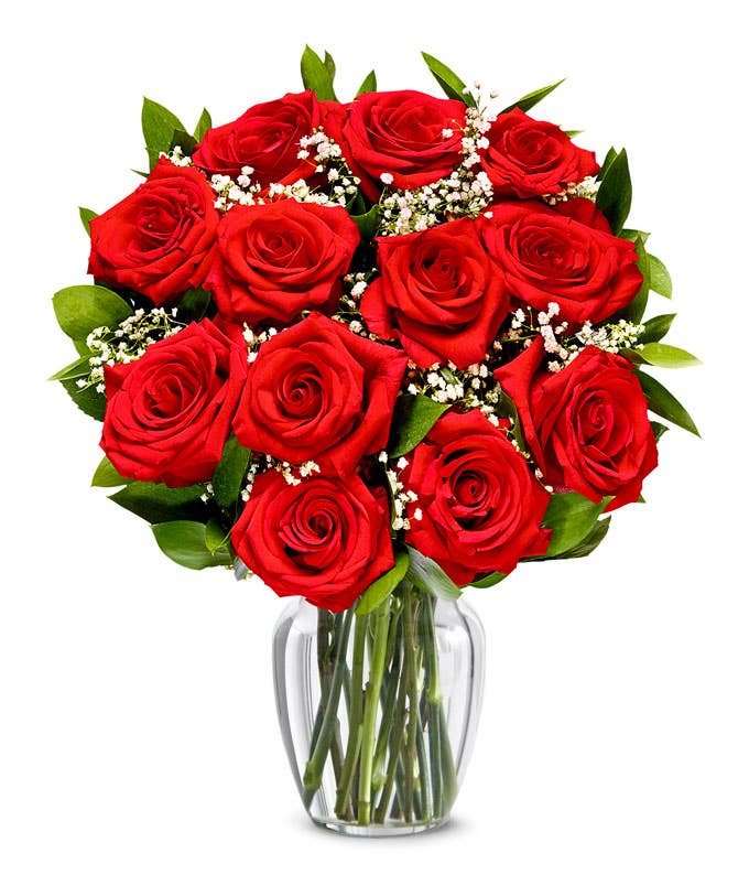 A Bouquet of 12 Long Stem Red Roses with Card Message Packaged Unless Vase Added