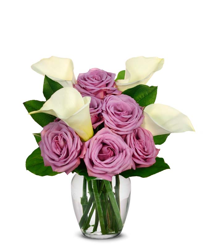 Lavender roses and white calla lilies in the rose and lily bouquet for same day flowers delivery