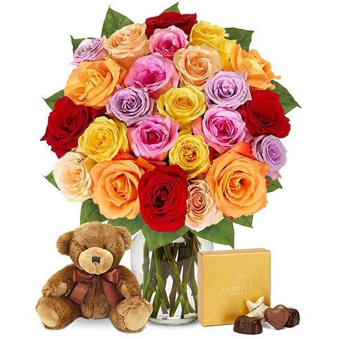 Two Dozen Rainbow Roses with Teddy Bear & Chocolates