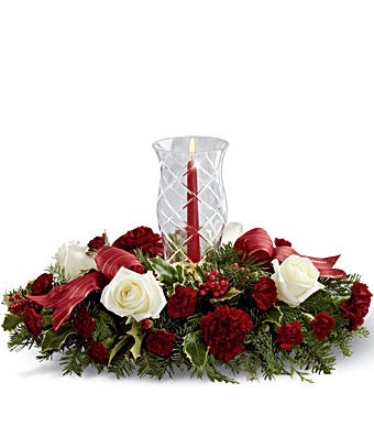 Holiday centerpiece of white roses, burgundy carnations & mini carnations 
