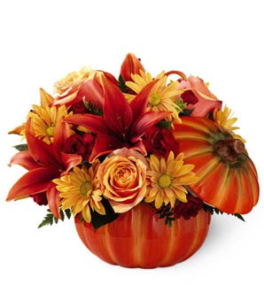 FTD Thanksgiving flowers delivered by a local florist in a ceramic pumpkin
