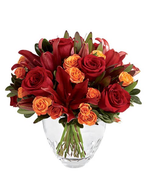Fall arrangement of fall flowers, red roses, orange roses & cheap flowers for free flower delivery