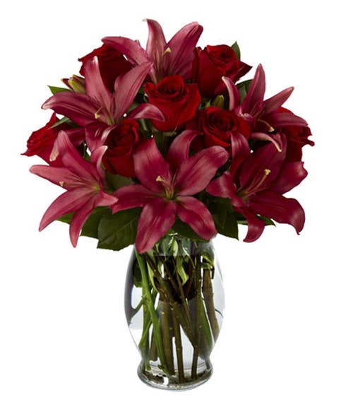 Red burgundy roses and burgundy maroon asiatic lily bouquet with vase
