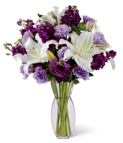 Purple flowers and white lily bouquet 