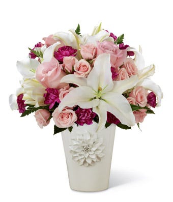 White lilies, pink roses and purple carnations