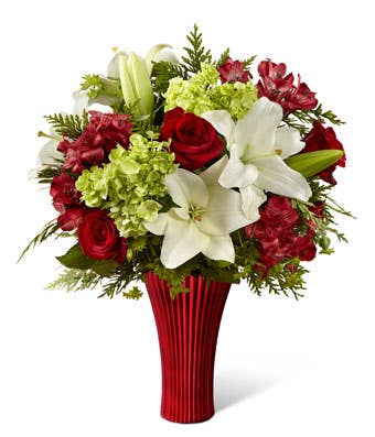 Red and green flower bouquet with green stock, white lilies and red roses