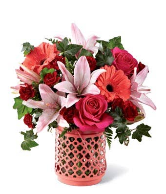 Coral flower candle lantern vase bouquet with coral gerbera daisies and pink lily