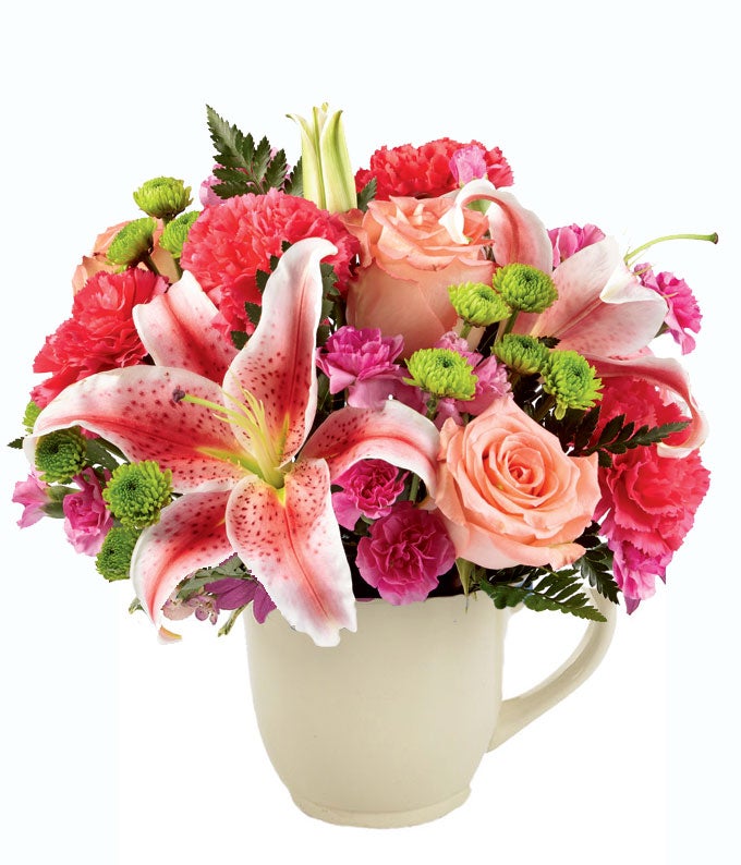 flower bouquet with stargazer lilies in a teacup