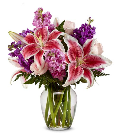 Stargazer lily delivery bouquet with purple stock and pale pink roses