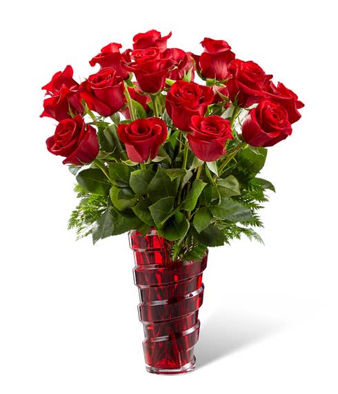 All red rose bouquet in a red vase
