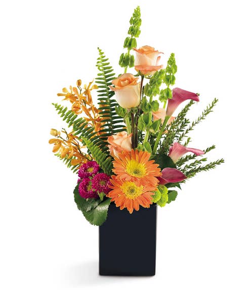 premium flower delivery with peach flowers, mokara orchids, orange gerbera daisy