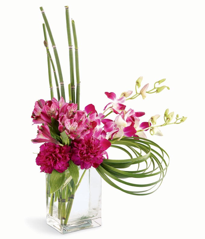  Fuchsia Dendrobium Orchids, Purple Alstroemeria, Hot-Pink Carnations in a Contemporary Glass Vase with Message Card Included