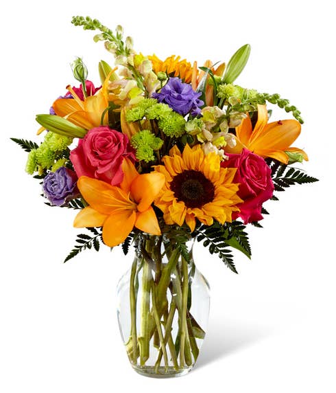 Orange lily and sunflower summer bouquet with hot pink roses and green mums