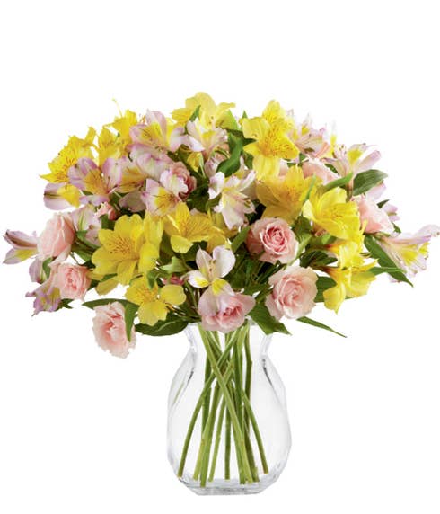 Yellow peruvian lilies and pink spray rose bouquet