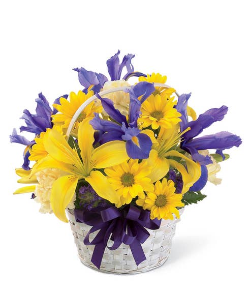 Mixed yellow lily and daisy flower basket bouquet with purple irises