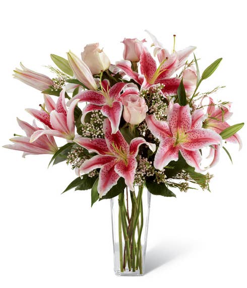 Pink stargazer lilies with pink roses