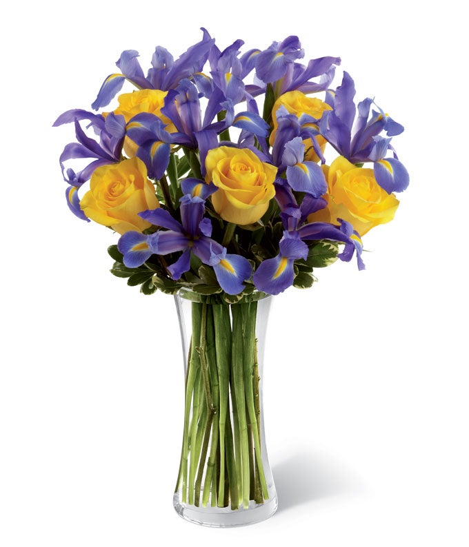 A Bouquet of Yellow Roses and Irises in a Slender Glass Vase