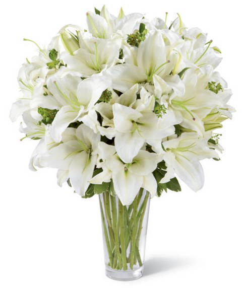 Premium white lily bouquet arrangement with clear glass vase