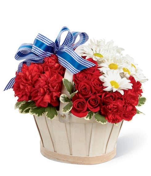 Basket of red roses and white daisies for 4th of July, Memorial Day or Veterans