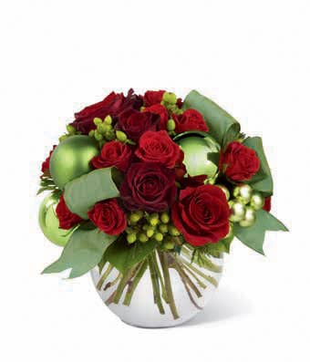 Unique holiday bouquet with red roses and spray roses with hypericum berries