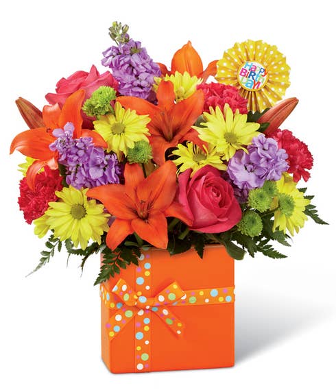 Happy birthday flower delivery in an orange flower bouquet with orange lilies and cheap flowers