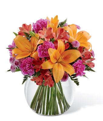 Cheap flowers from send flowers online of tropical flowers and orange lily bouquet