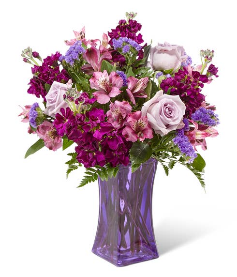 Purple flower bouquet delivery with lavender roses