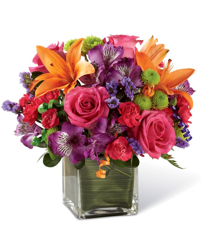 This happy birthday flower arrangement screams happiness, brightness and let's get this birthday party started!