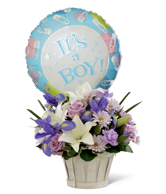 A Bouquet of New Baby Boy Balloon, Purple Roses, White Asiatic Lilies, Blue Iris, and Light Lilac Daisies in a Woven Basket