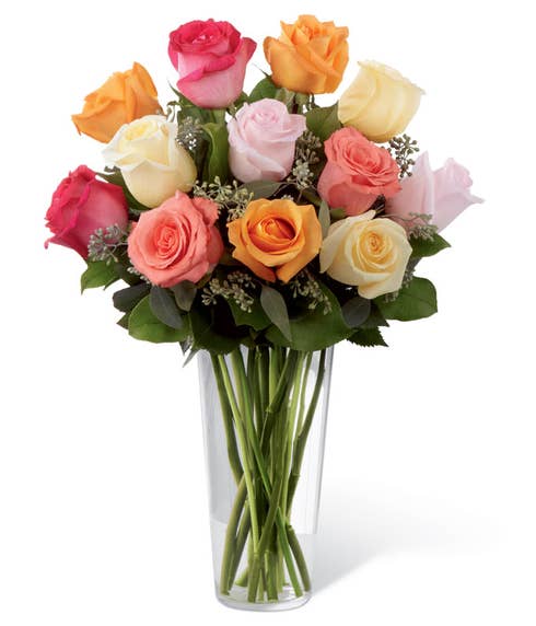 One dozen long stem roses with cheap flowers, orange roses, and peach roses for flower delivery