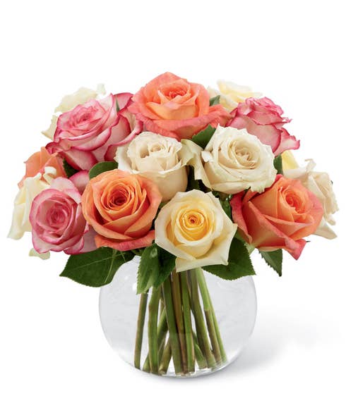 Bubble bowl mixed roses flowers bouquet with light pink, peach and white roses