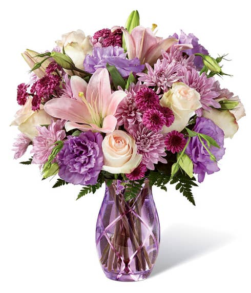 lavender flower bouquet with peach lilies and pale pink roses for cheap flowers delivery